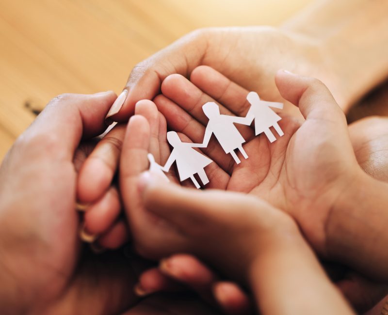 Hands, family and paper cutout, support and connection, link and bonding, foster care and adoption